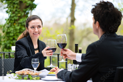 Photo: Businesspeople having lunch in restaurant Businesspeople having lunch in restaurant
