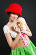 Photo: Pretty girl in german style with ice cream Pretty girl in german style with ice cream