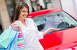Shopping woman winning a car