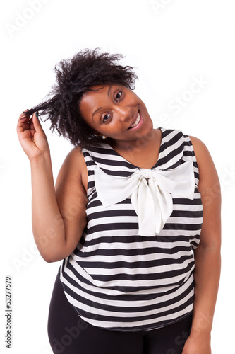 Photo: Young fatty black woman holding her hairs - African people Young fatty black woman holding her hairs - African people