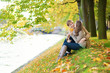 Dating couple on the river bank