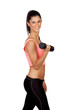 Attractive brunette girl tightening their muscles