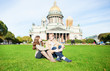Couple on the grass near St. Isaac's cathedral