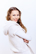 Photo: Young woman wearing warm sweater Young woman wearing warm sweater