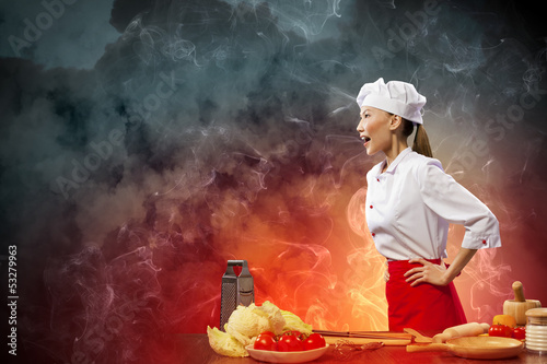 Photo: Asian female cook in anger Asian female cook in anger
