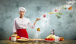 Foto: Asian female cook with knife Asian female cook with knife