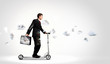 Photo: Businessman riding scooter Businessman riding scooter