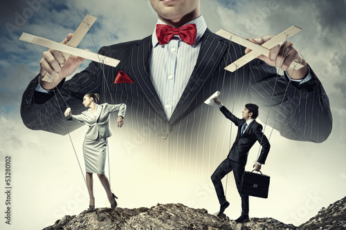 Photo: Businessman puppeteer Businessman puppeteer