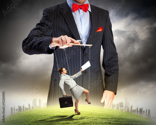Photo: Businessman puppeteer Businessman puppeteer
