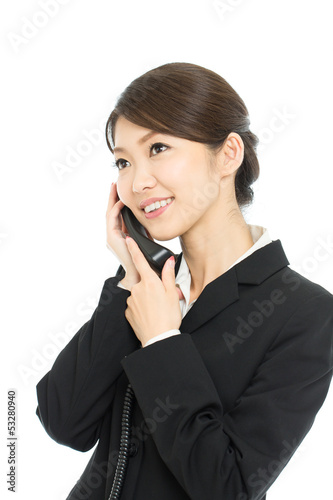 Photo: Beautiful asian business woman isolated on white background Beautiful asian business woman isolated on white background