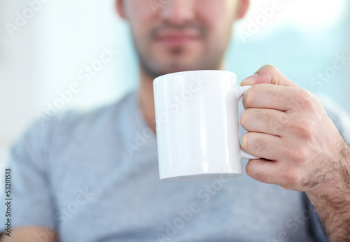 Photo: Holding mug Holding mug