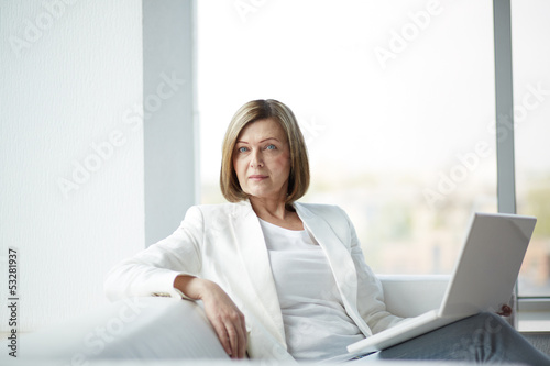 Photo: Woman with laptop Woman with laptop