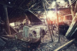 car in sunlight barn
