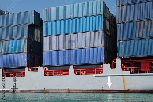 Photo: Container ship docked in port Container ship docked in port