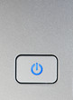 Silver power button close-up