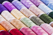 Colourful cotton reels background