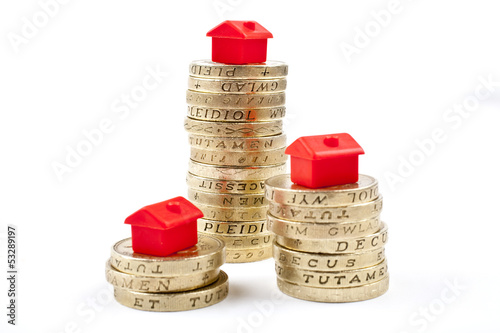 Photo: £1 Coins Stacked in Three Piles £1 Coins Stacked in Three Piles