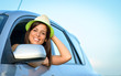 Woman in car smiling
