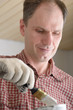Foto: Contractor with paintbrush Contractor with paintbrush