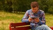 Young man with tablet computer.