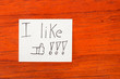 I like - Post it Note on Wood Background