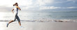 Woman running on the beach.