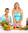 Family pregnant woman preparing food .