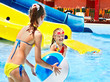 Children  swimming in pool.