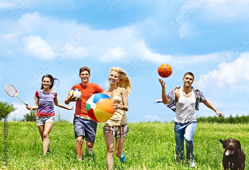 Photo: Group people summer outdoor. Group people summer outdoor.