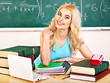 Foto: Woman in classroom. Woman in classroom.