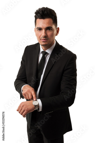 Photo: Businessman saying time is money Businessman saying time is money