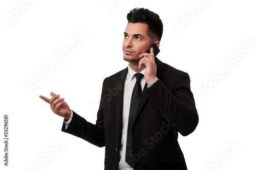 Photo: Businessman talking on the phone Businessman talking on the phone