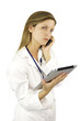 Serious female doctor talking on the phone
