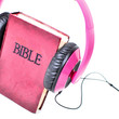Bible stand with headphone on white background.