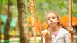 Video: Little girl eating an apple Little girl eating an apple