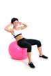 Young woman with a fitness ball