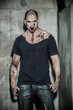 Photo: a scary and bloody zombie man a scary and bloody zombie man