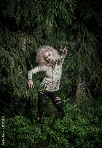 Photo: a scary undead zombie girl a scary undead zombie girl