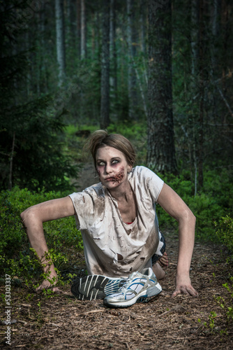 Photo: a scary undead zombie girl a scary undead zombie girl