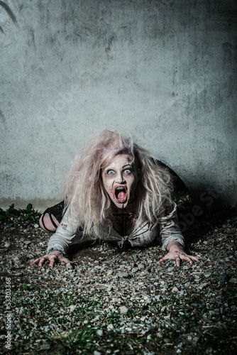 Photo: a scary undead zombie girl a scary undead zombie girl