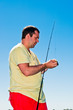 fisherman with fishing rod