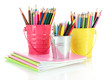 Colorful pencils with copybooks isolated on white