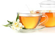 Cup of tea with jasmine, isolated on white