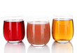 Glasses of fresh juice isolated on white