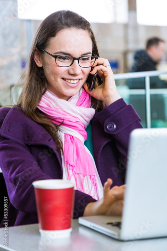 Photo: Young Woman inside Train Station or Airport Young Woman inside Train Station or Airport