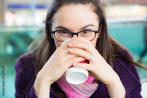 Photo: Young Woman inside Train Station or Airport Young Woman inside Train Station or Airport