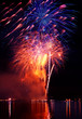 Foto: Colorful firework in a night sky Colorful firework in a night sky