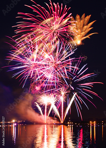 Photo: Colorful firework in a night sky Colorful firework in a night sky