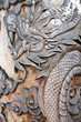 Pictures dragon carved from wood.