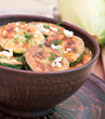 Fried zucchini in an old ceramic bowl